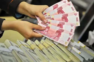 Rupiah yang anjlok ke level Rp 16.060 per dolar AS menjadi sorotan utama menjelang rilis kebijakan suku bunga The Fed dan Bank Indonesia.