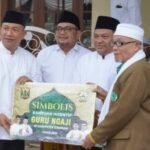 Ketua DPRD Kabupaten Sukabumi, Budi Azhar Mutawali, mendampingi Bupati Sukabumi H. Asep Japar (Asjap) memperkenalkan program unggulan bidang keagamaan dalam acara Muhibah