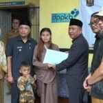 IMG 20250623 WA0021 Peringatan Harganas Ke 32 di Kabupaten Sukabumi, Wabup Serahkan Santunan Bagi Keluarga Risiko Stunting