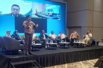 Dewas BPJS Kesehatan Siruaya Utamawan menyampaikan materi dalam Focus Group Discussion (FGD) di Bogor. (Telusurbisnis)