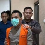 Kades Neglasari Rahmat Hidayat ditetapkan tersangka kasus dugaan korupsi dana AKD dan PBB. (Prima Arno/Telusurbisnis)