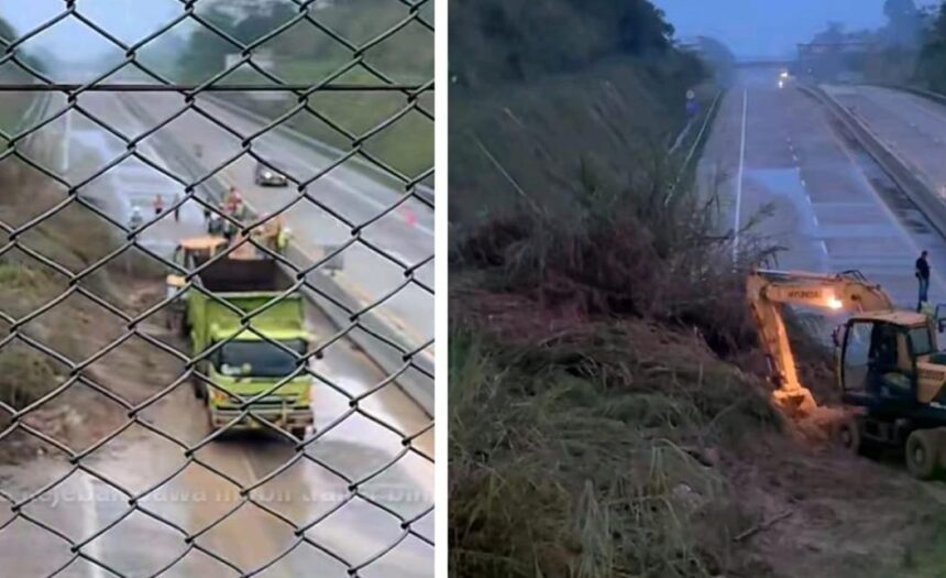 Proses evakuasi material longsor yang menutup sebagian jalur tol bocimi kearah Jakarta. (Prima Meidiandi/Telusurbisnis)