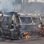 Petugas Damkar berusaha memadamkan api angkot terbakar di Jalan Perintis Kemerdekaan. (Dok Damkar)